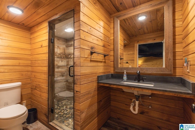 1794 Riverknolle Rd, Tallassee, AL 36078 - bathroom with wooden ceiling, toilet, a sink, wooden walls, and a shower stall