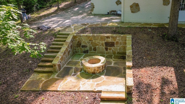 1794 Riverknolle Rd, Tallassee, AL 36078 - exterior view of an outdoor fire pit