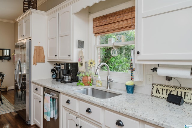 312 La Playa Pl, Homewood, AL 35209 - kitchen with freestanding refrigerator, a sink, white cabinets, dark wood-style flooring, and light stone counters