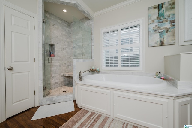 312 La Playa Pl, Homewood, AL 35209 - bathroom with a bath, crown molding, a shower stall, and wood finished floors