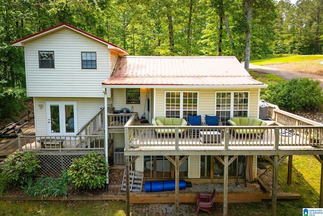 327 County Road 4315, Wedowee, AL 36278 - back of property with an outdoor living space, a deck, and metal roof