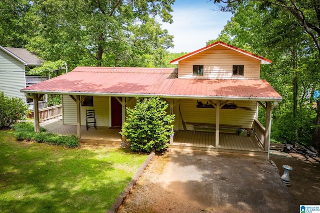 327 County Road 4315, Wedowee, AL 36278 - view of front of property with ceiling fan, driveway, a front yard, and metal roof