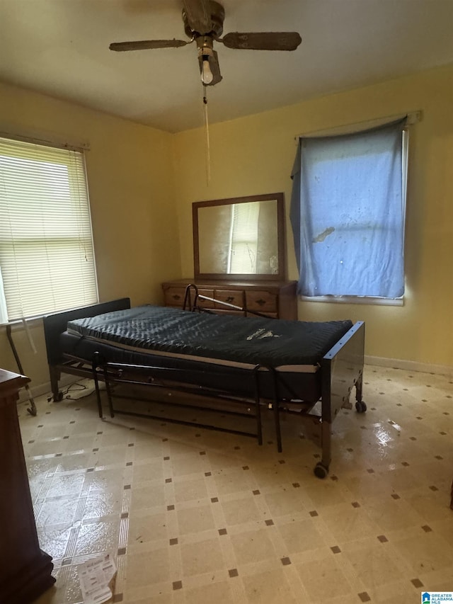 9709 Mize Rd, Remlap, AL 35133 - bedroom with light flooring, ceiling fan, and baseboards