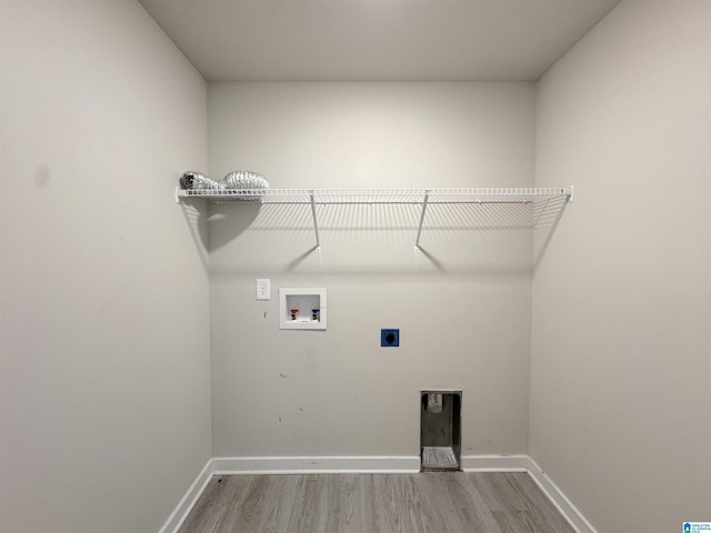 115 Ridgeview Cir, Jemison, AL 35085 - laundry room with wood finished floors, electric dryer hookup, hookup for a washing machine, and baseboards
