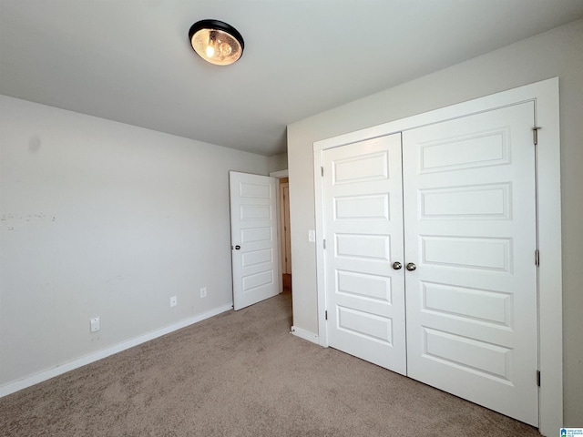 115 Ridgeview Cir, Jemison, AL 35085 - unfurnished bedroom with carpet flooring, baseboards, and a closet
