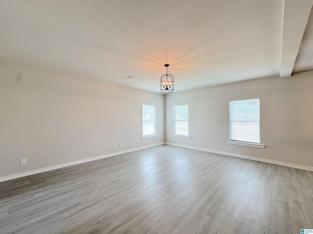 115 Ridgeview Cir, Jemison, AL 35085 - unfurnished room featuring wood finished floors, baseboards, and a chandelier