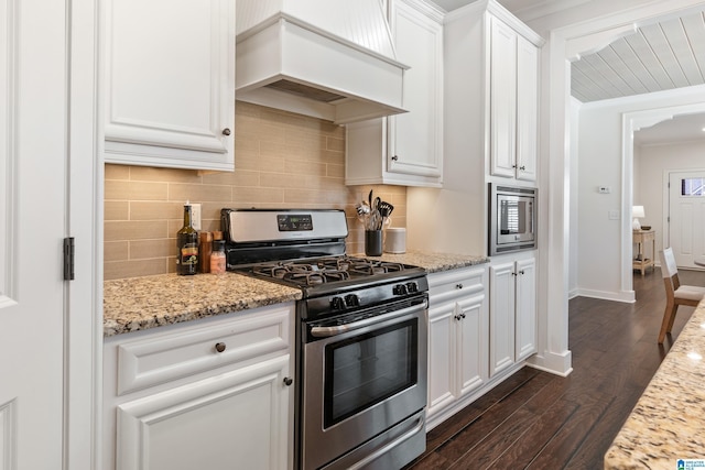 2982 Kelham Grove Way, Birmingham, AL 35242 - kitchen featuring appliances with stainless steel finishes, custom exhaust hood, dark wood-type flooring, white cabinetry, and backsplash