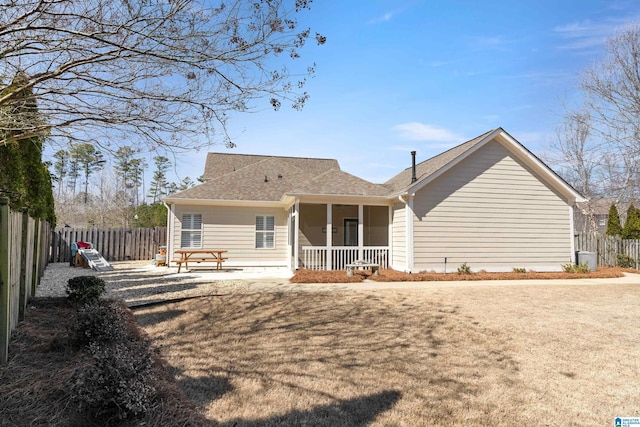 2982 Kelham Grove Way, Birmingham, AL 35242 - rear view of house with a fenced backyard and a shingled roof