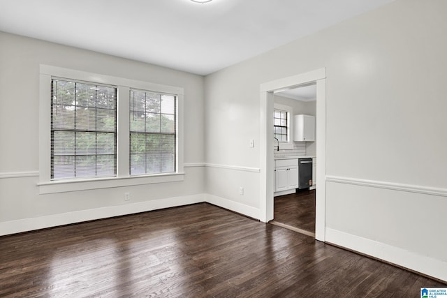 809 15th St W, Birmingham, AL 35208 - unfurnished room with healthy amount of natural light, wood finished floors, and baseboards