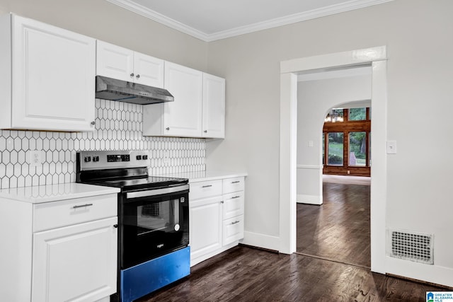 809 15th St W, Birmingham, AL 35208 - kitchen with electric stove, under cabinet range hood, arched walkways, dark wood-style floors, and crown molding
