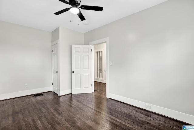 809 15th St W, Birmingham, AL 35208 - unfurnished room with wood finished floors, ceiling fan, and baseboards