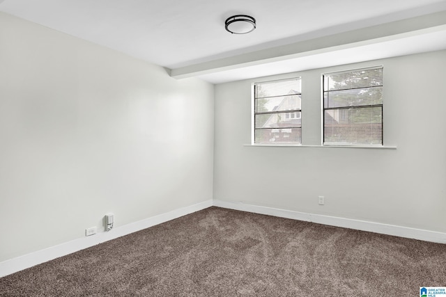 809 15th St W, Birmingham, AL 35208 - unfurnished room featuring dark carpet and baseboards