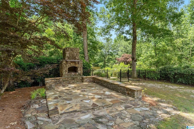 1272 Highland Lakes Trl, Birmingham, AL 35242 - view of patio with an outdoor stone fireplace