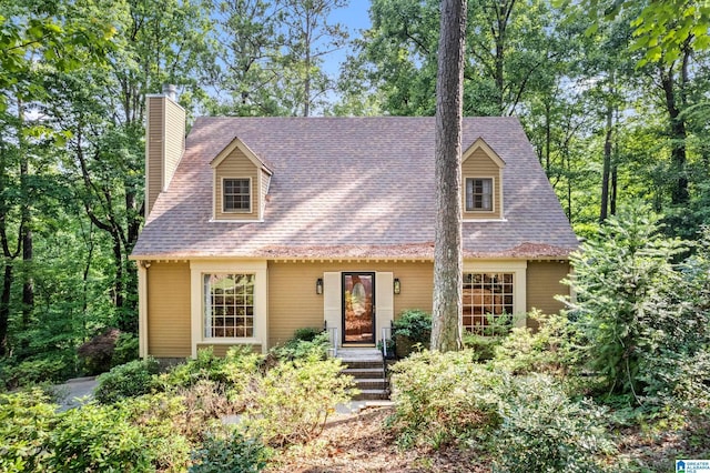 2013 Crossvine Rd, Hoover, AL 35244 - cape cod-style house with a chimney