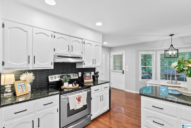 2013 Crossvine Rd, Hoover, AL 35244 - kitchen featuring stainless steel electric range, under cabinet range hood, white cabinetry, backsplash, and dark stone countertops