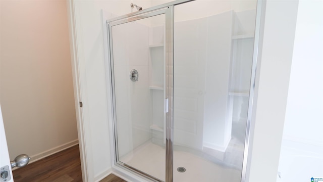 629 Fish Camp Rd, Chelsea, AL 35043 - bathroom with a shower stall, wood finished floors, and baseboards