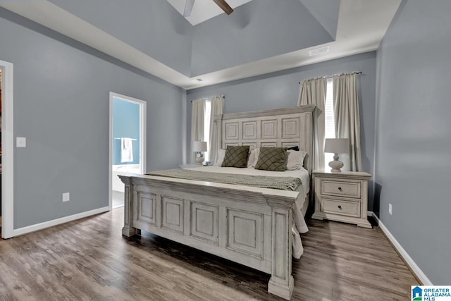 2304 Spaulding Pl, Moody, AL 35004 - bedroom featuring dark wood finished floors, baseboards, a ceiling fan, and a raised ceiling