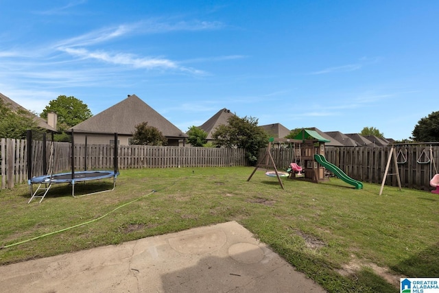 2304 Spaulding Pl, Moody, AL 35004 - view of yard featuring a trampoline and a playground