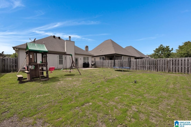 2304 Spaulding Pl, Moody, AL 35004 - view of yard featuring a trampoline and a playground