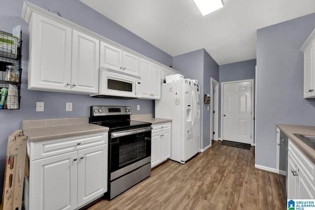 2304 Spaulding Pl, Moody, AL 35004 - kitchen with white appliances, white cabinetry, light wood finished floors, and light countertops