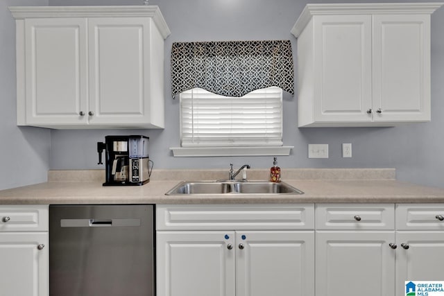 2304 Spaulding Pl, Moody, AL 35004 - kitchen with stainless steel dishwasher, a sink, and white cabinets