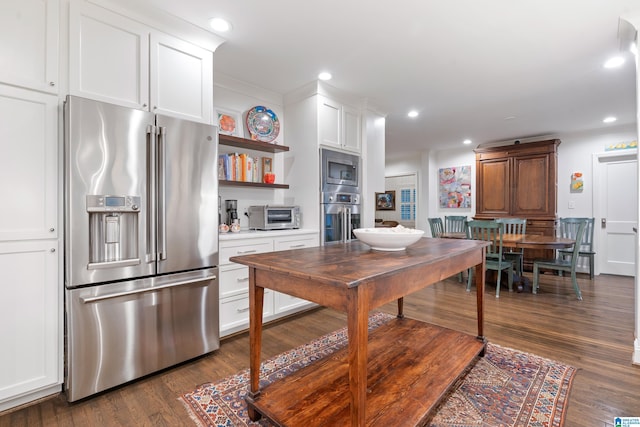 409 Euclid Ave, Mountain Brook, AL 35213 - kitchen with stainless steel appliances, open shelves, dark wood-type flooring, white cabinets, and recessed lighting