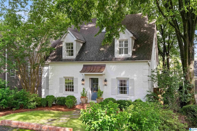 409 Euclid Ave, Mountain Brook, AL 35213 - cape cod-style house featuring brick siding and roof with shingles