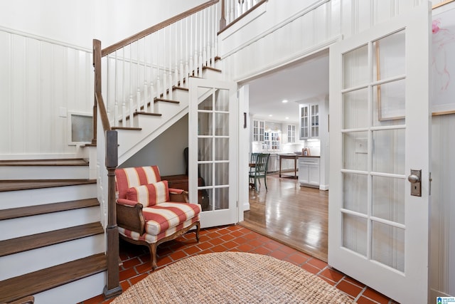 409 Euclid Ave, Mountain Brook, AL 35213 - staircase with recessed lighting and tile patterned floors