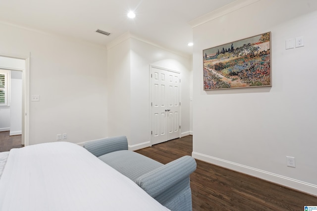 409 Euclid Ave, Mountain Brook, AL 35213 - bedroom with wood finished floors, baseboards, recessed lighting, crown molding, and a closet