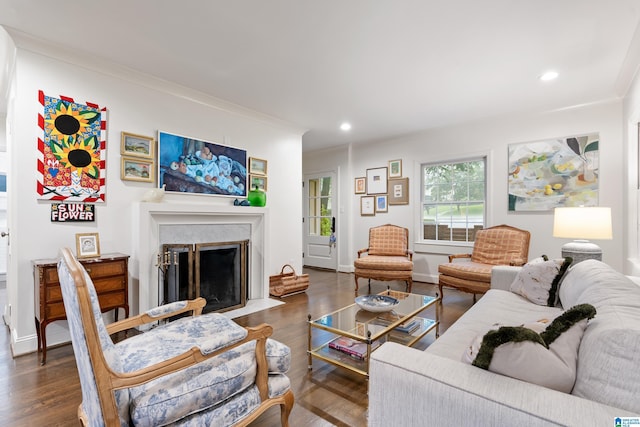 409 Euclid Ave, Mountain Brook, AL 35213 - living room featuring wood finished floors, crown molding, recessed lighting, a fireplace with flush hearth, and baseboards