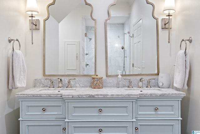409 Euclid Ave, Mountain Brook, AL 35213 - bathroom featuring double vanity and tiled shower