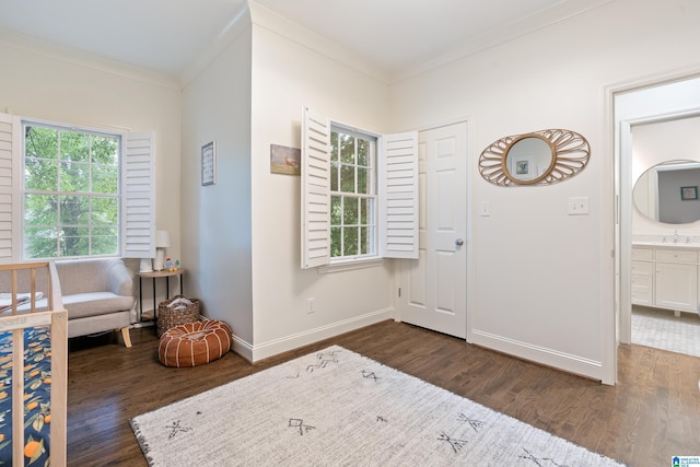 409 Euclid Ave, Mountain Brook, AL 35213 - foyer entrance with ornamental molding, plenty of natural light, dark wood-style flooring, and baseboards