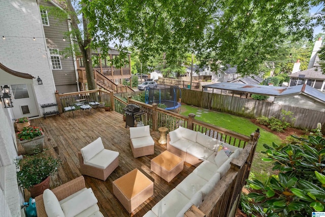 409 Euclid Ave, Mountain Brook, AL 35213 - wooden terrace with a trampoline, an outdoor living space, and stairway