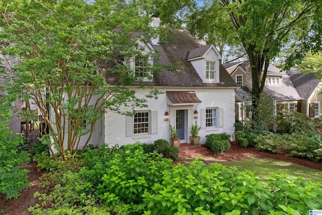 409 Euclid Ave, Mountain Brook, AL 35213 - view of front facade featuring brick siding, a chimney, and a shingled roof