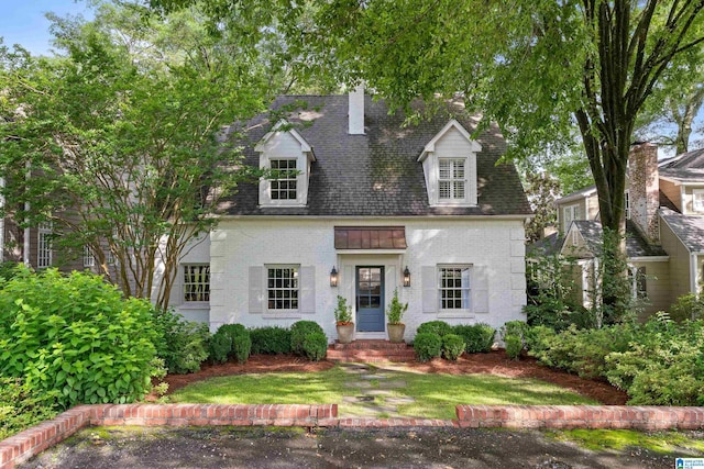 409 Euclid Ave, Mountain Brook, AL 35213 - cape cod-style house with brick siding, a chimney, and a shingled roof