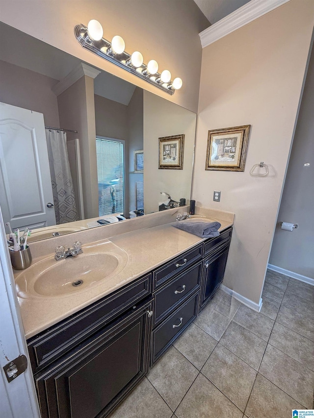 184 Raptor Way, Anniston, AL 36207 - bathroom featuring tile patterned floors, double vanity, baseboards, ornamental molding, and a shower with shower curtain