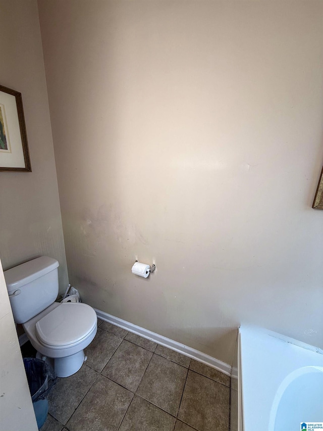 184 Raptor Way, Anniston, AL 36207 - bathroom with toilet, tile patterned floors, and baseboards