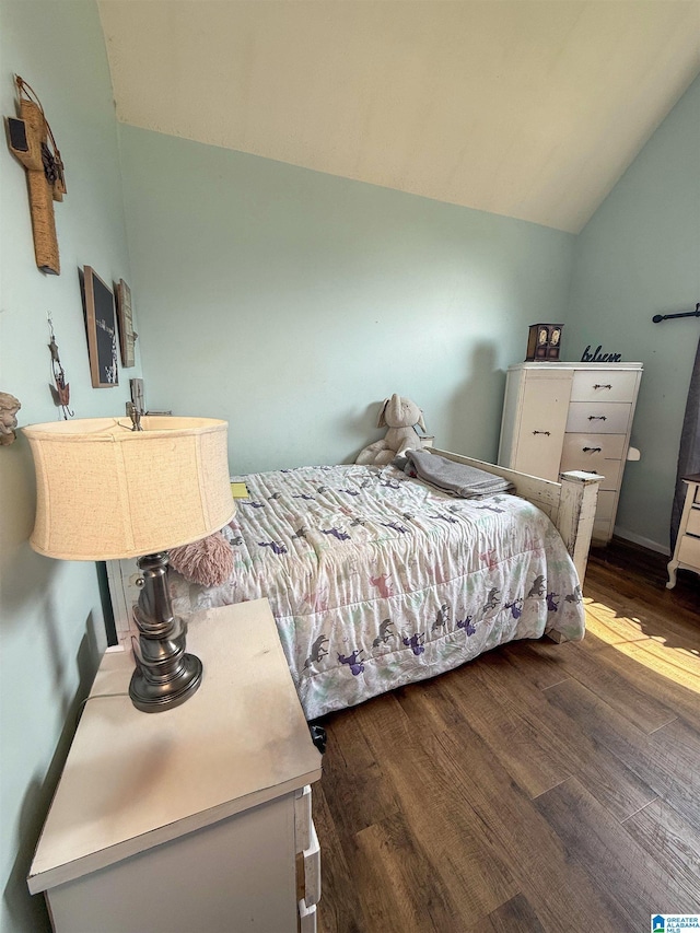 184 Raptor Way, Anniston, AL 36207 - bedroom with lofted ceiling and wood finished floors