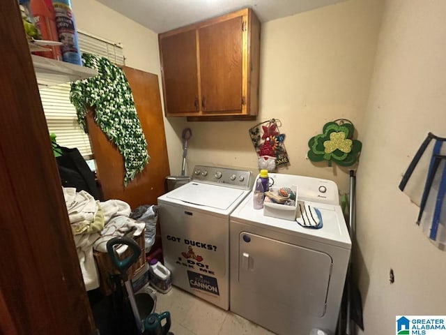409 Morningview St, Athens, AL 35611 - laundry area with cabinet space and washing machine and clothes dryer