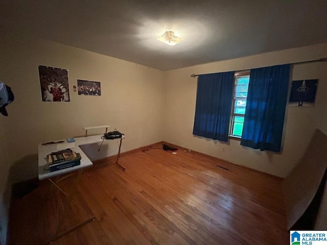 409 Morningview St, Athens, AL 35611 - unfurnished room with wood finished floors and baseboards