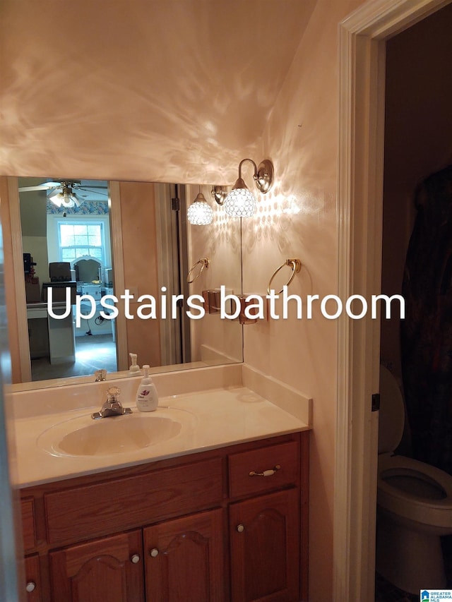 3409 Red Valley Rd, Remlap, AL 35133 - bathroom with vanity, toilet, and ceiling fan