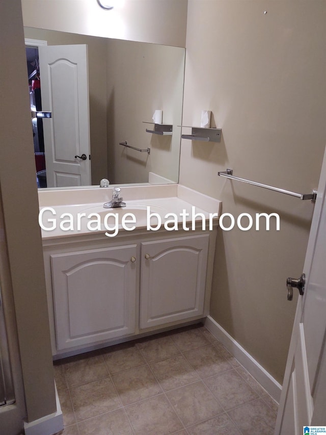 3409 Red Valley Rd, Remlap, AL 35133 - bathroom with vanity, tile patterned flooring, and baseboards