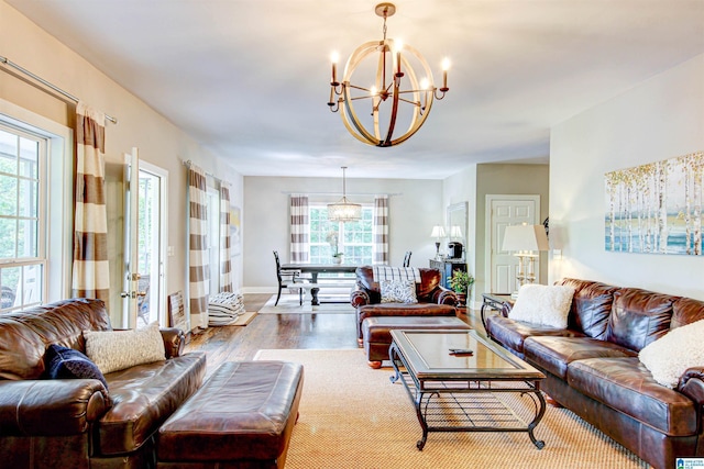 86 Waters Dr, Wedowee, AL 36278 - living room featuring a chandelier, wood finished floors, baseboards, and french doors