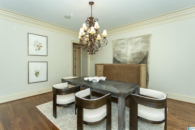 4338 Kings Mountain Rdg, Vestavia Hills, AL 35242 - dining area featuring a chandelier, baseboards, crown molding, and dark wood-style flooring