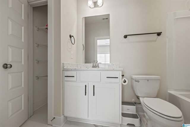 173 Atlantic Ln, Birmingham, AL 35242 - bathroom with vanity, toilet, and baseboards