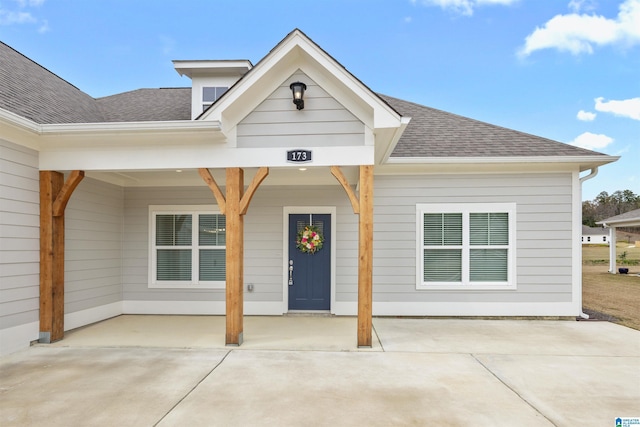 173 Atlantic Ln, Birmingham, AL 35242 - view of front of home with a shingled roof and a patio area