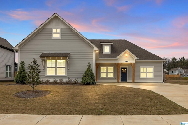 173 Atlantic Ln, Birmingham, AL 35242 - view of front of home with a front lawn, driveway, and roof with shingles