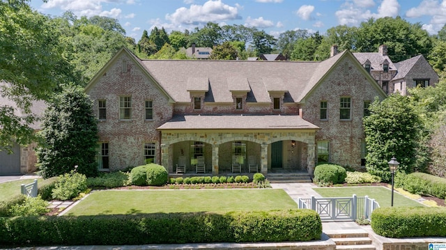 3242 Country Club Rd, Mountain Brook, AL 35213 - view of front of property with a gate, covered porch, a chimney, brick siding, and stone siding