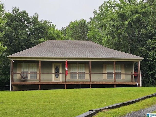 288 Briarfield Rd, Warrior, AL 35180 - farmhouse inspired home featuring roof with shingles, a front yard, and covered porch