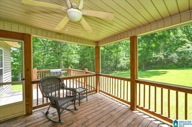 288 Briarfield Rd, Warrior, AL 35180 - wooden terrace with a ceiling fan, a yard, and view of wooded area